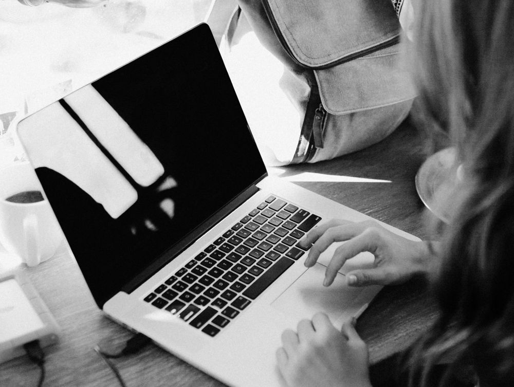 Navigating on a laptop.